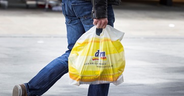 Dm-drogeriemarkt plastic bag shopping street sale stock photo seo
